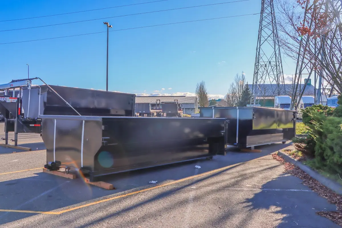 Roll-off dumpster ready for waste disposal at job site for 20 Yard Dumpster Rental in Lacey